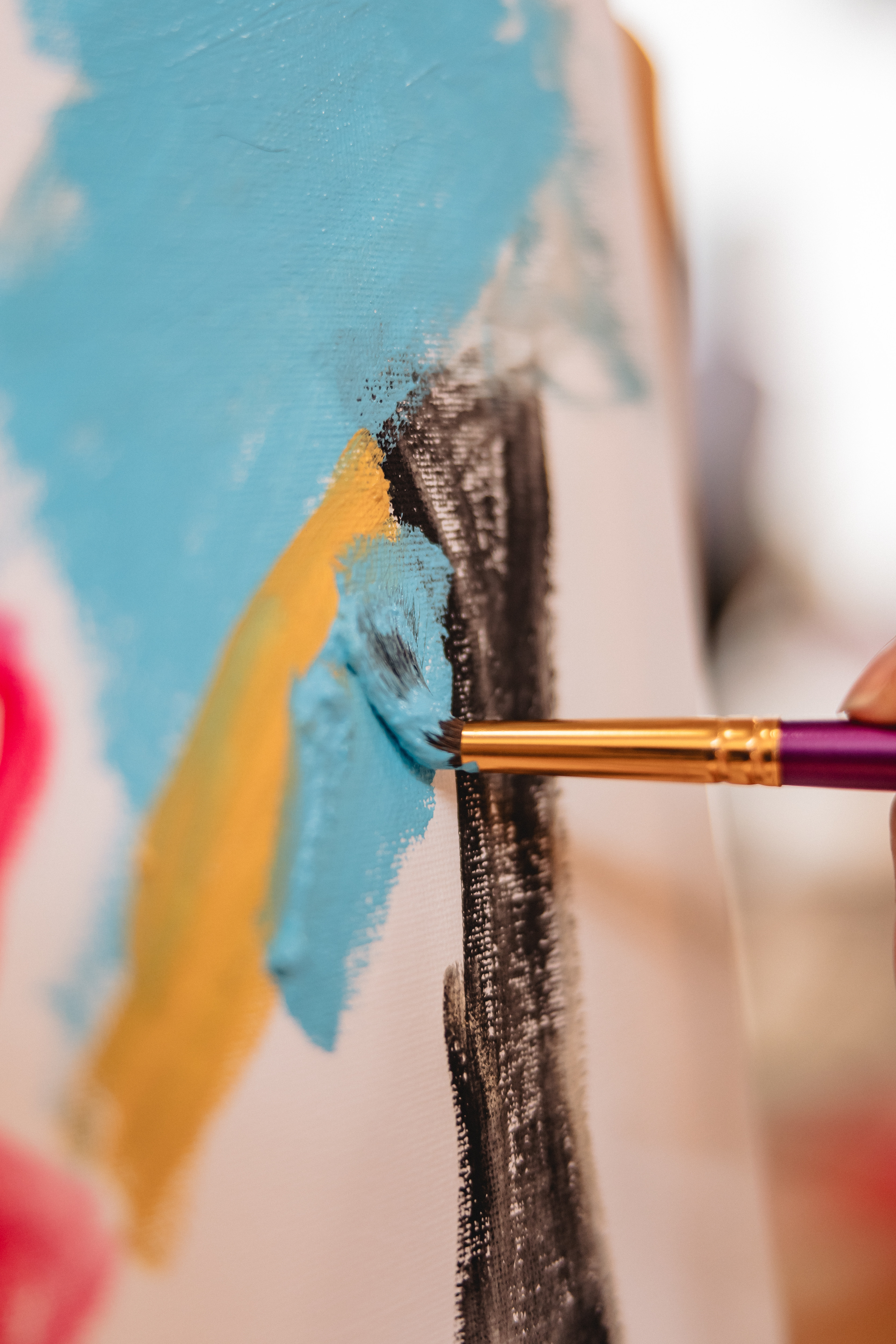 Artist painting on canvas