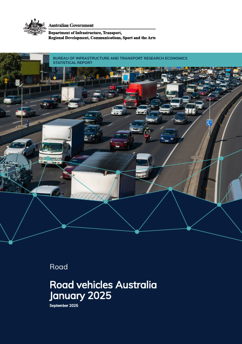 Cars and trucks on busy road