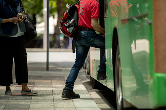 person boarding a bus